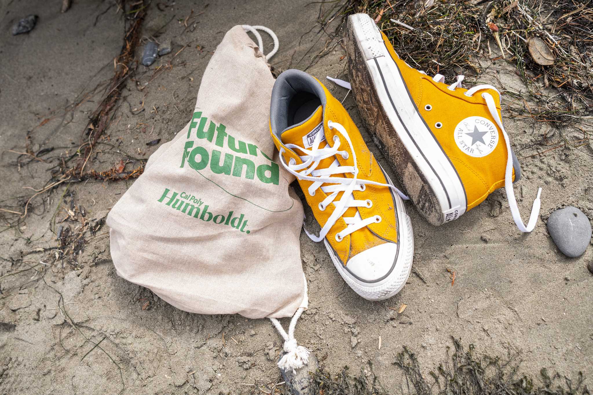 A pair of shoes next to a Cal Poly Humboldt branded bag that says "Future Found"