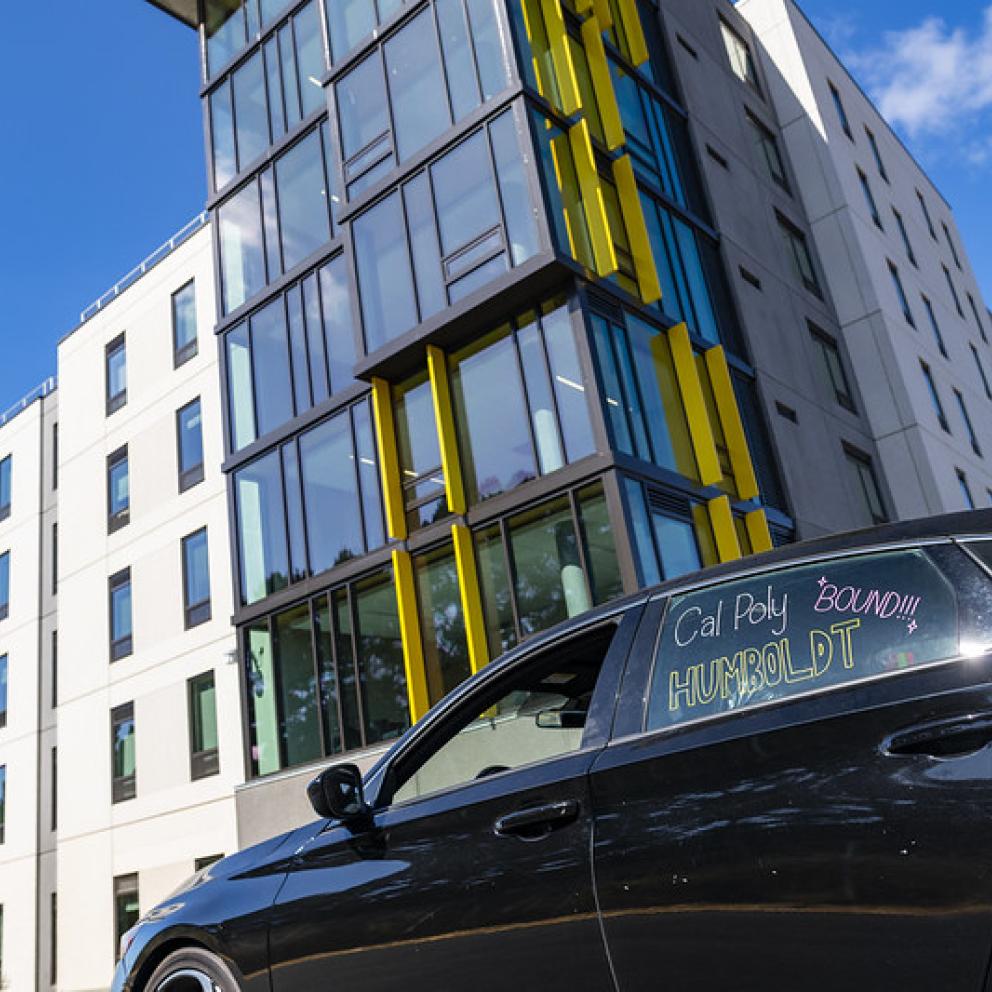car in front of building