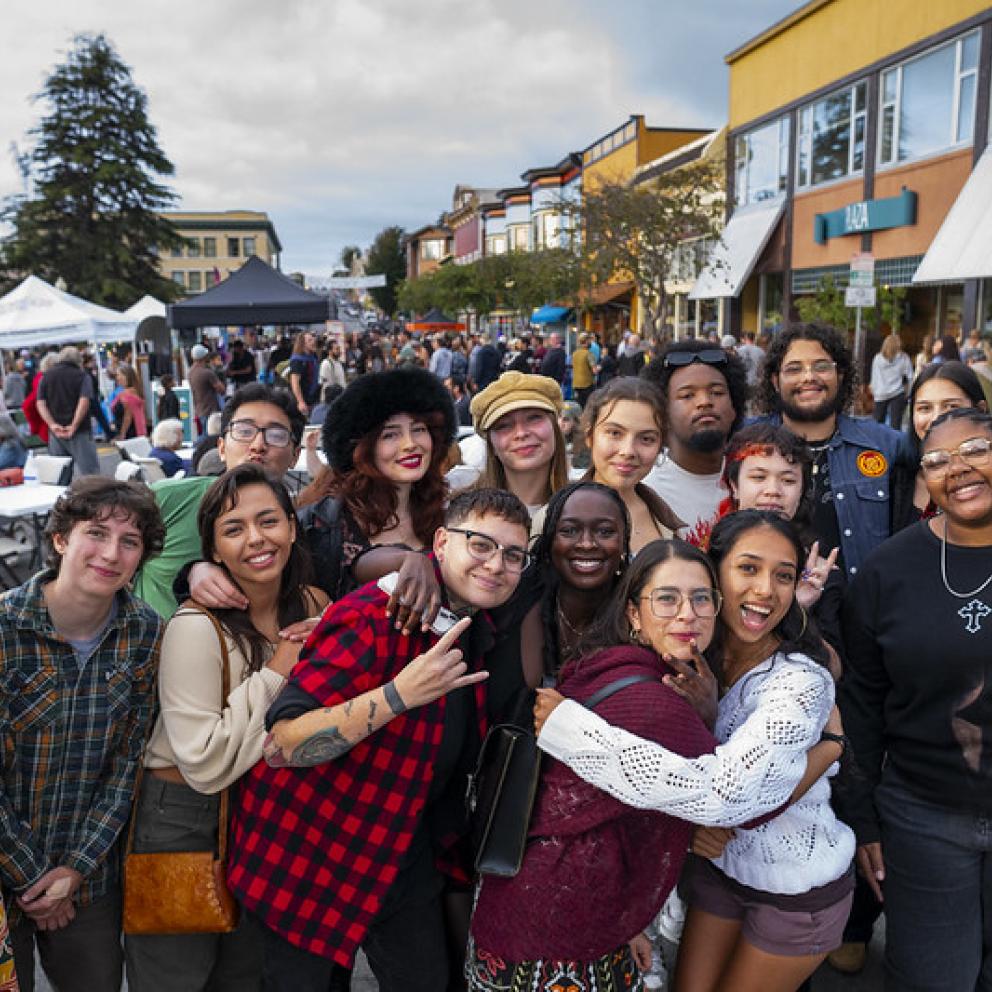 students smiling at a market