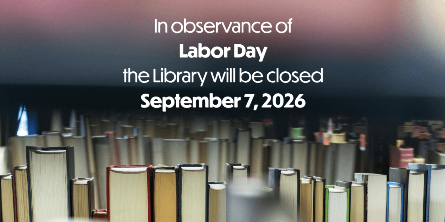 Close up of books on the shelves saying In observance of Labor Day the library will be closed on Sept. 7