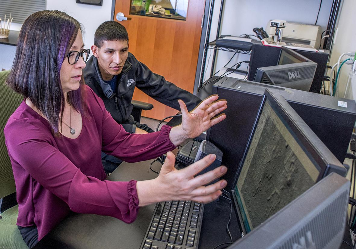Faculty and Student in lab