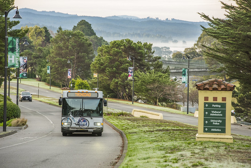 Bus driving on the roads towards campus