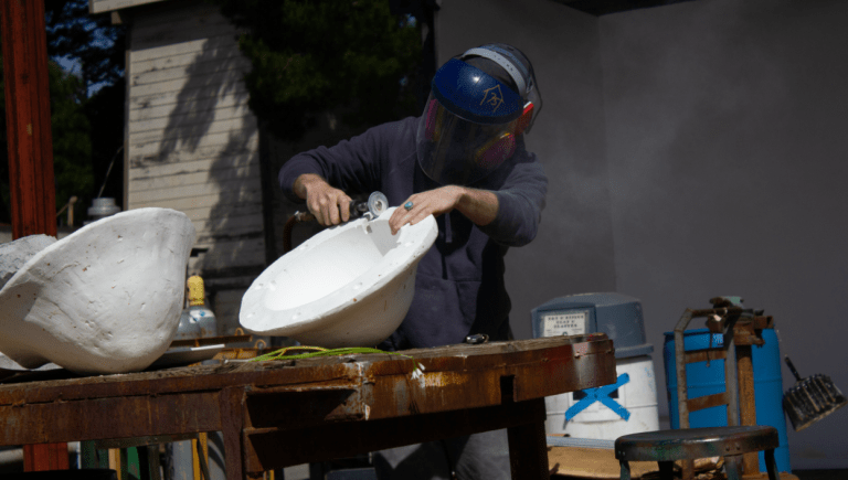 Student working on a plaster mould