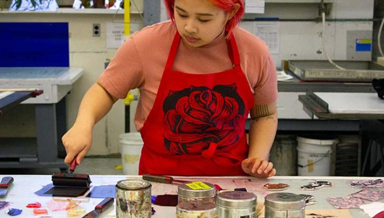 Student in printmaking lab