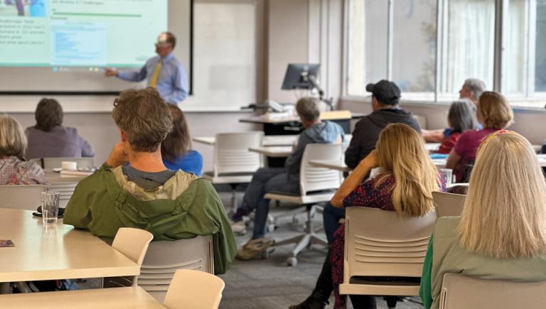 classroom of OLLI students listening to an instructor
