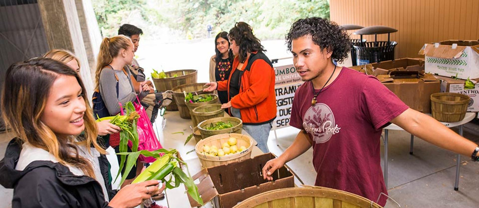 Students getting produce