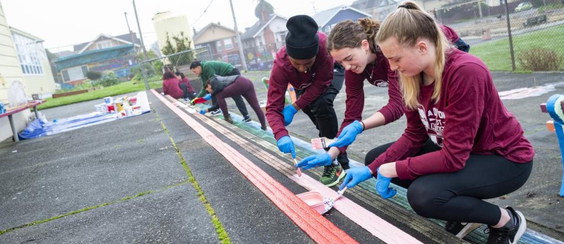Women's basketball team painting at Jefferson