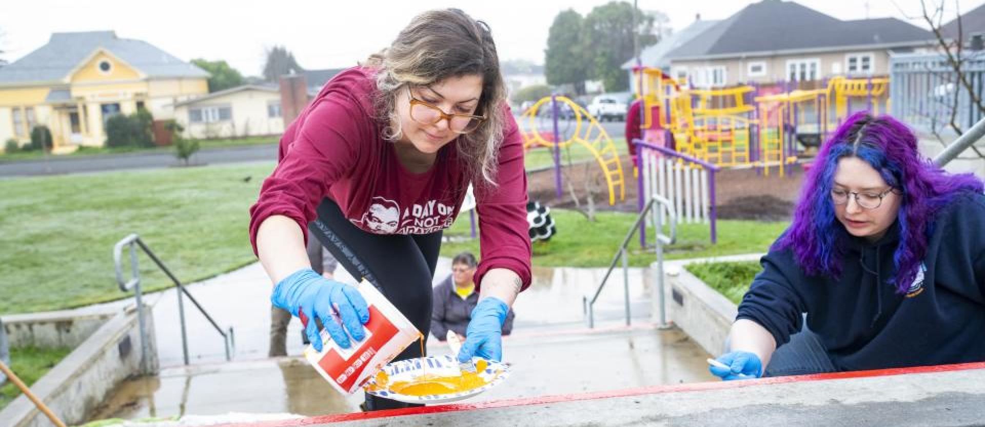 Painting the rainbow stairs at Jefferson