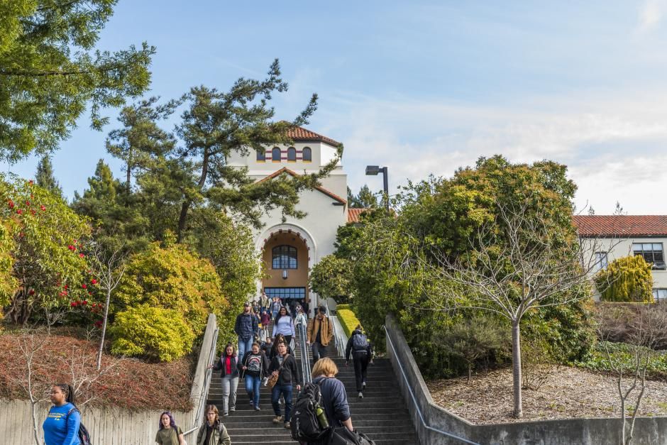 Students walking down the stairs of Founders Hall