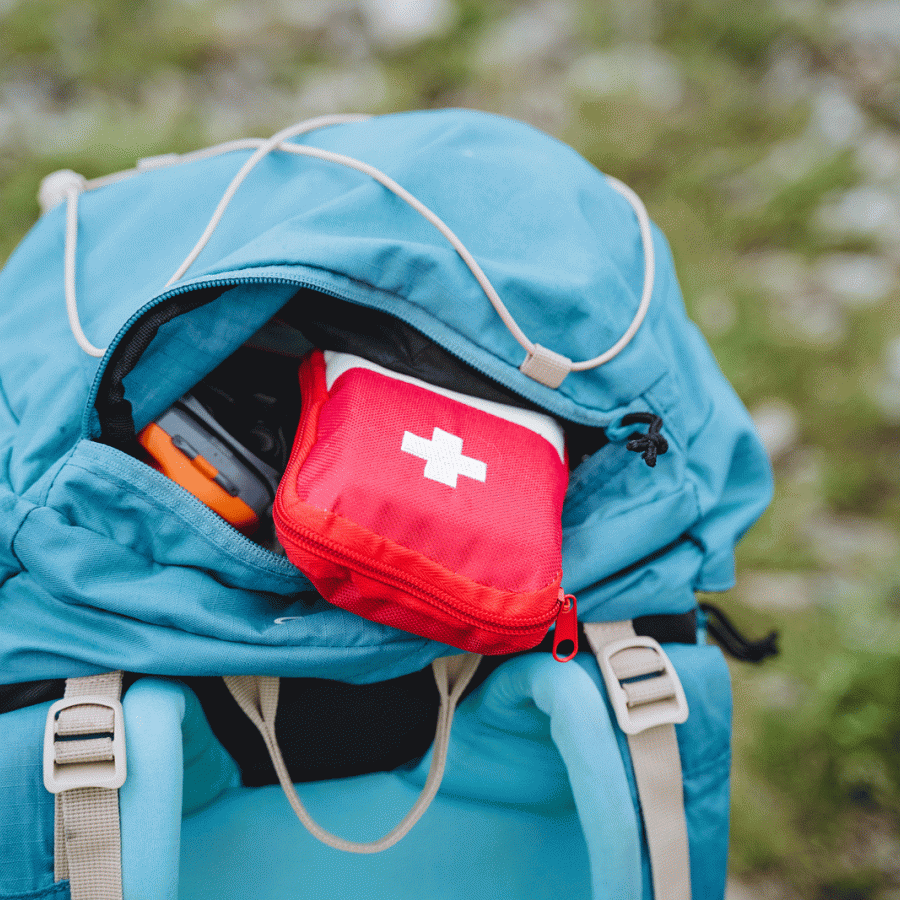 First Aid Kit in the top of a backpacking pack