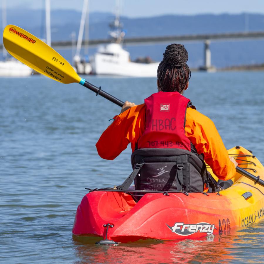 person kayaking on Humboldt Bay