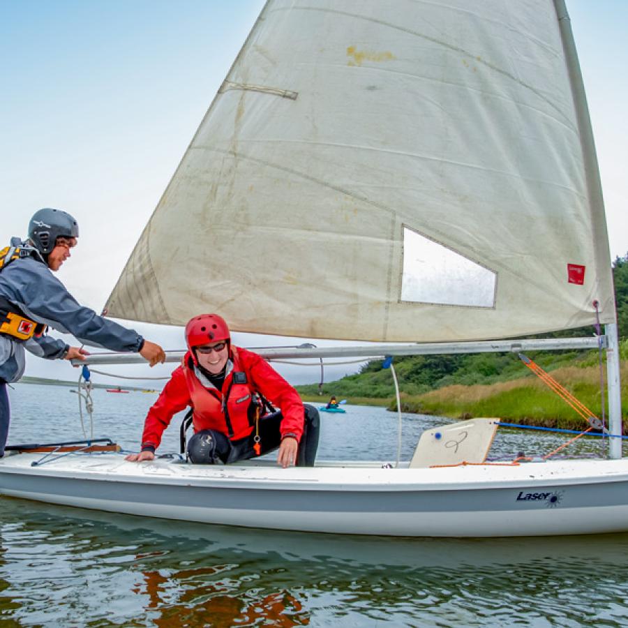 2 people on sailboat