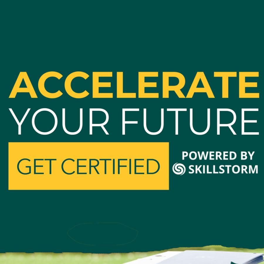 Accelerate your future. Get Certified. Powered by SkillStorm - Student working on her laptop