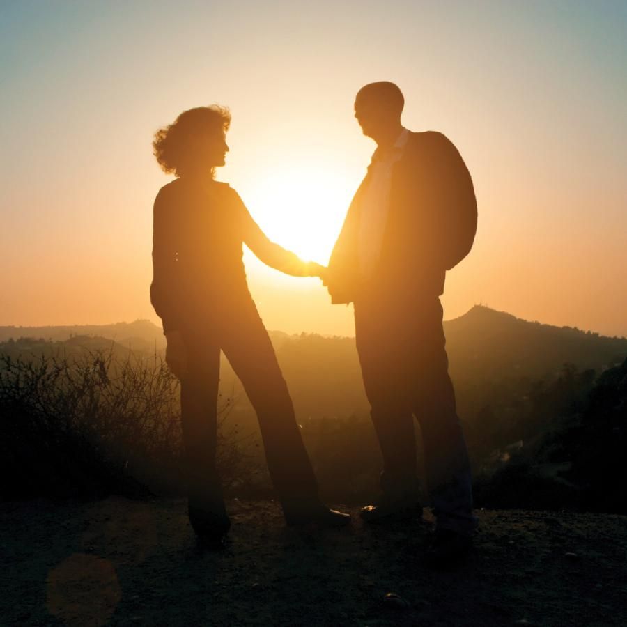 Older couple watching sunset Older couple watching sunset