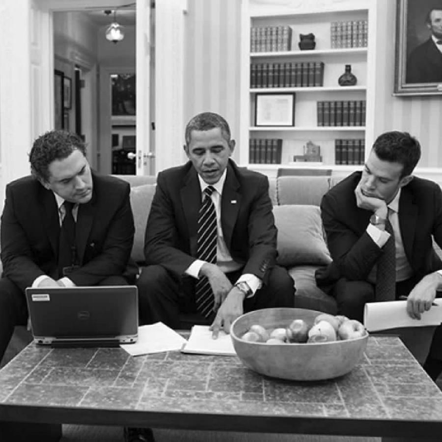 President Obama and his speechwriters working at a table President Obama and his speechwriters working at a table