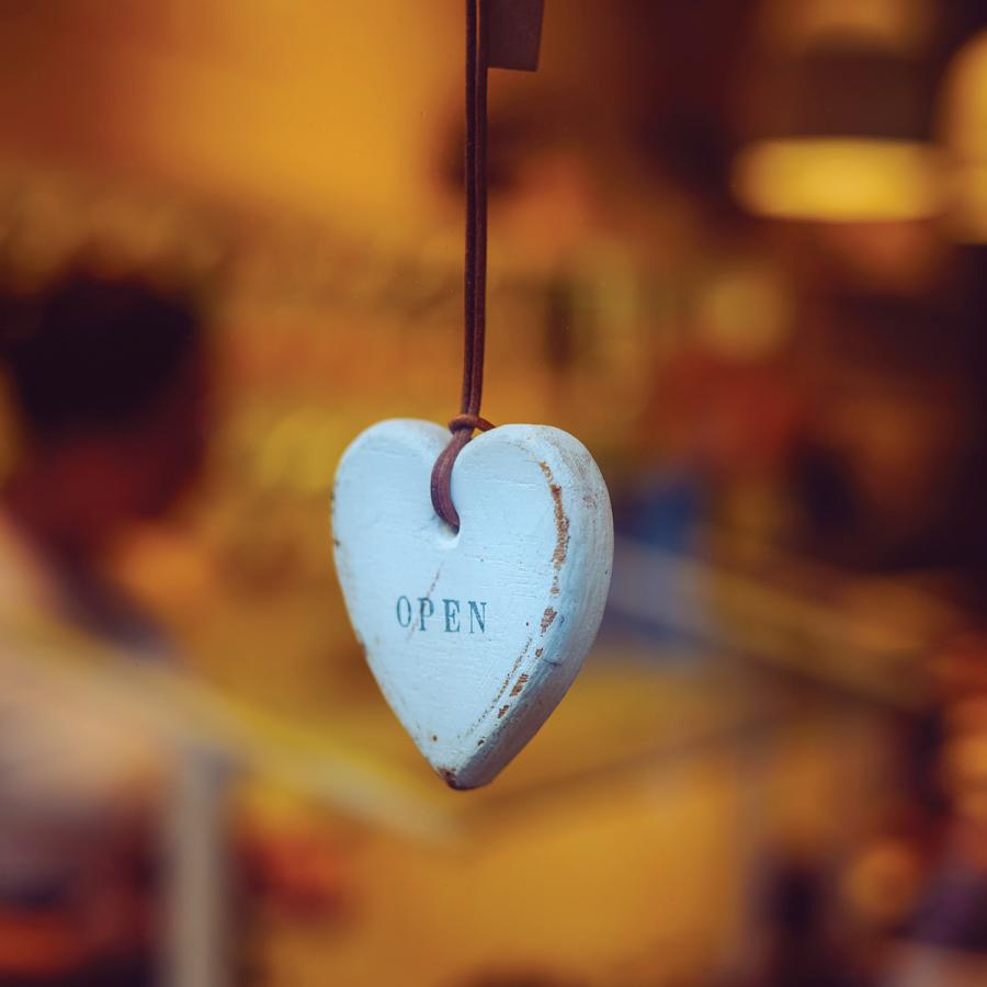 Heart shaped hanging ornament with the word "OPEN" on it Heart shaped hanging ornament with the word "OPEN" on it